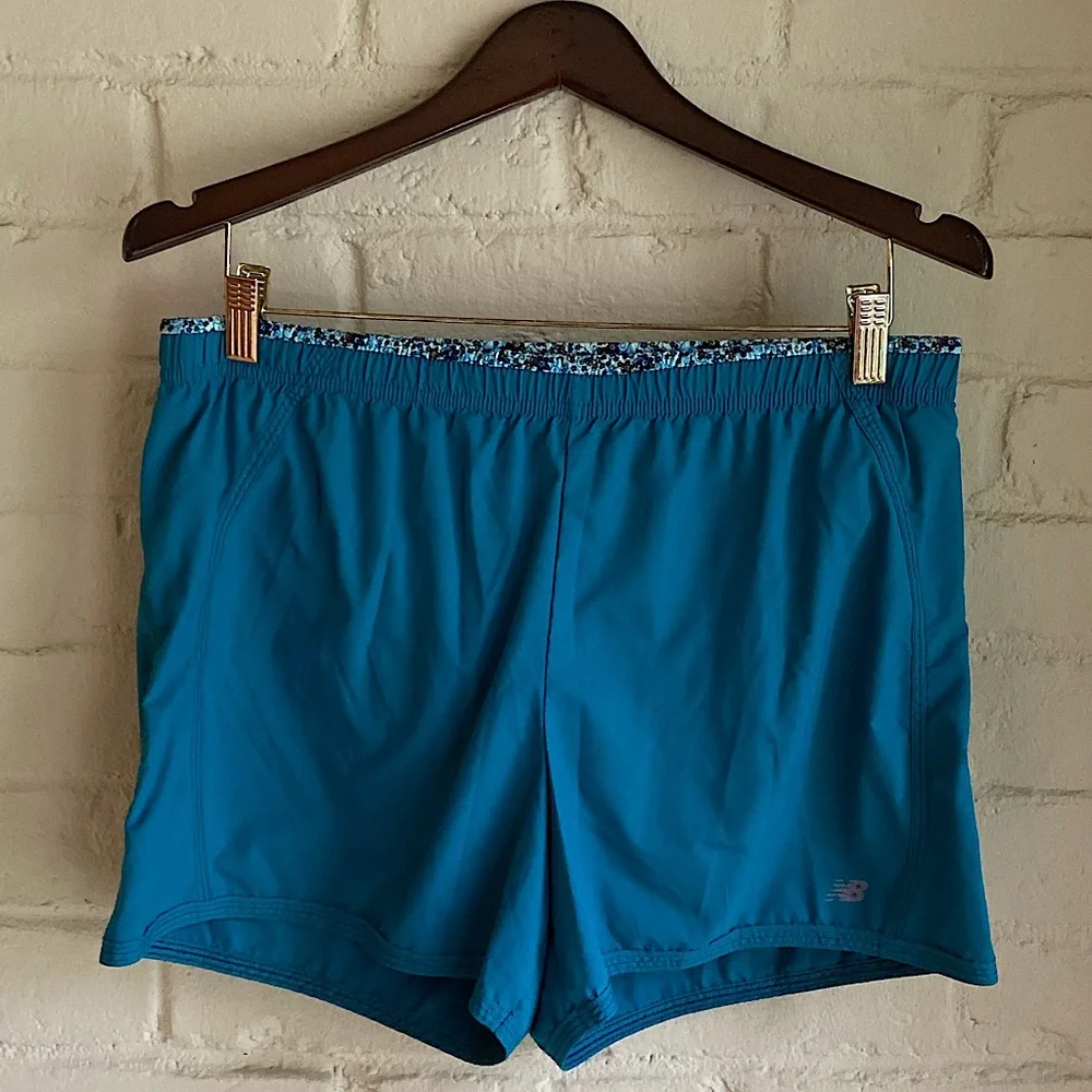 New Balance women’s turquoise blue floral athletic running shorts size medium